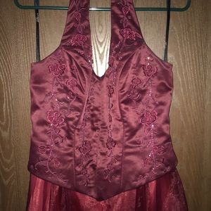 Full-length, maroon, prom dress.